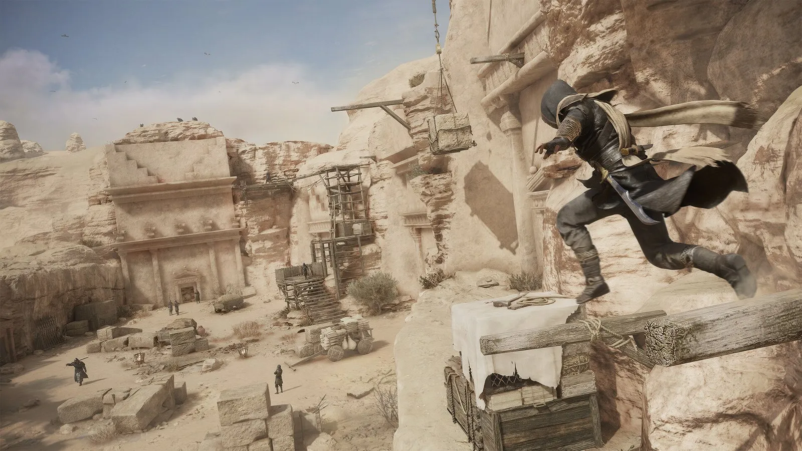 Basim salta entre tejados de adobe en una callejuela de Bagdad en Assassin's Creed Mirage