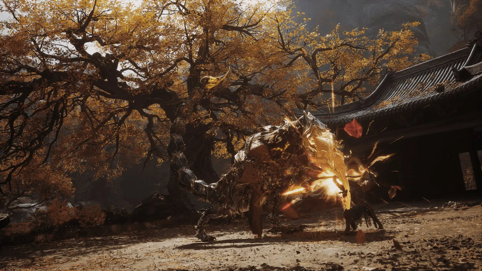 El Destinado esquiva a un jefe de pelaje dorado entre hojas de otoño en Black Myth: Wukong