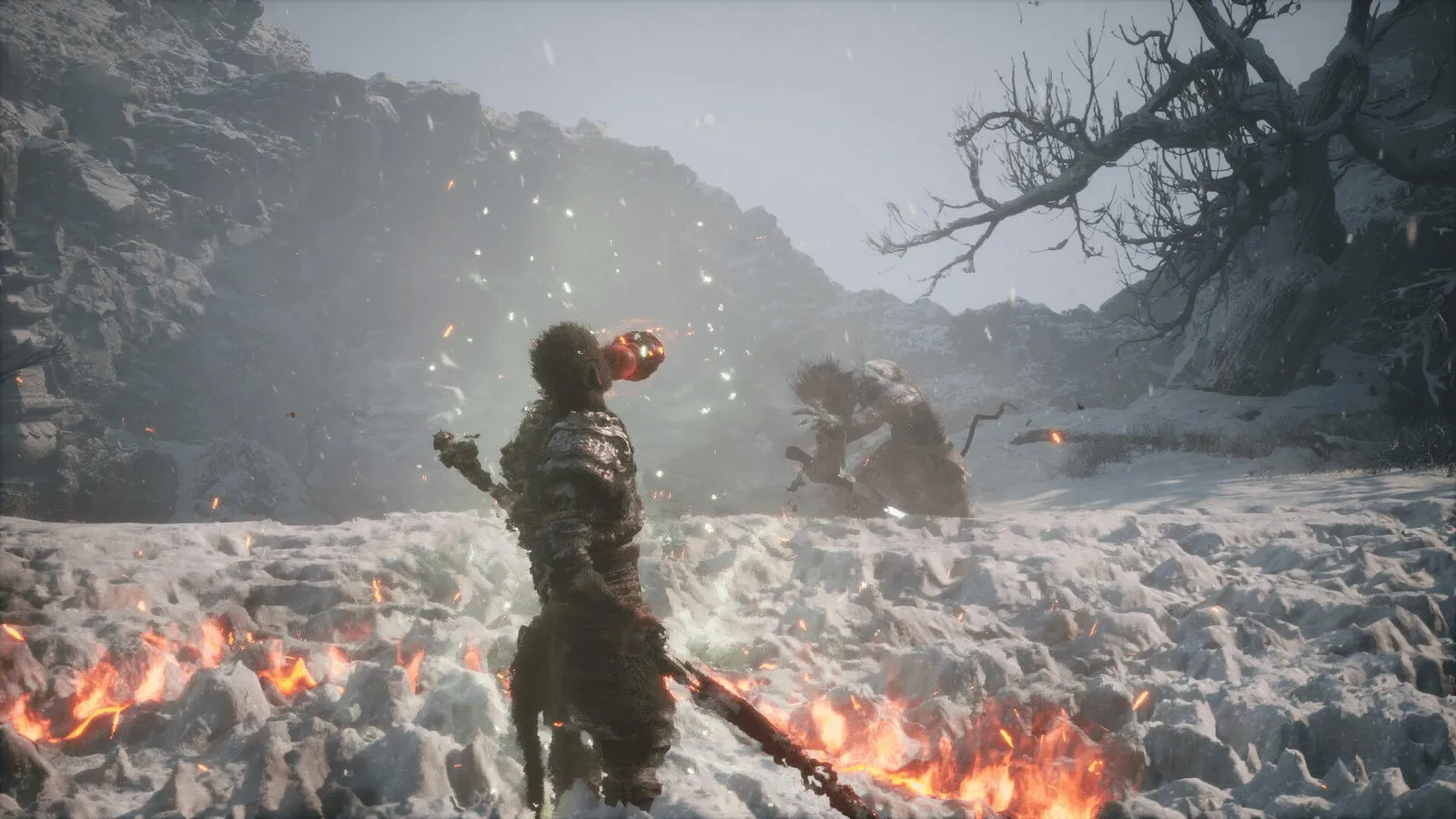 El Destinado, con su bastón, se enfrenta a un enemigo en un campo lleno de llamas en Black Myth: Wukong