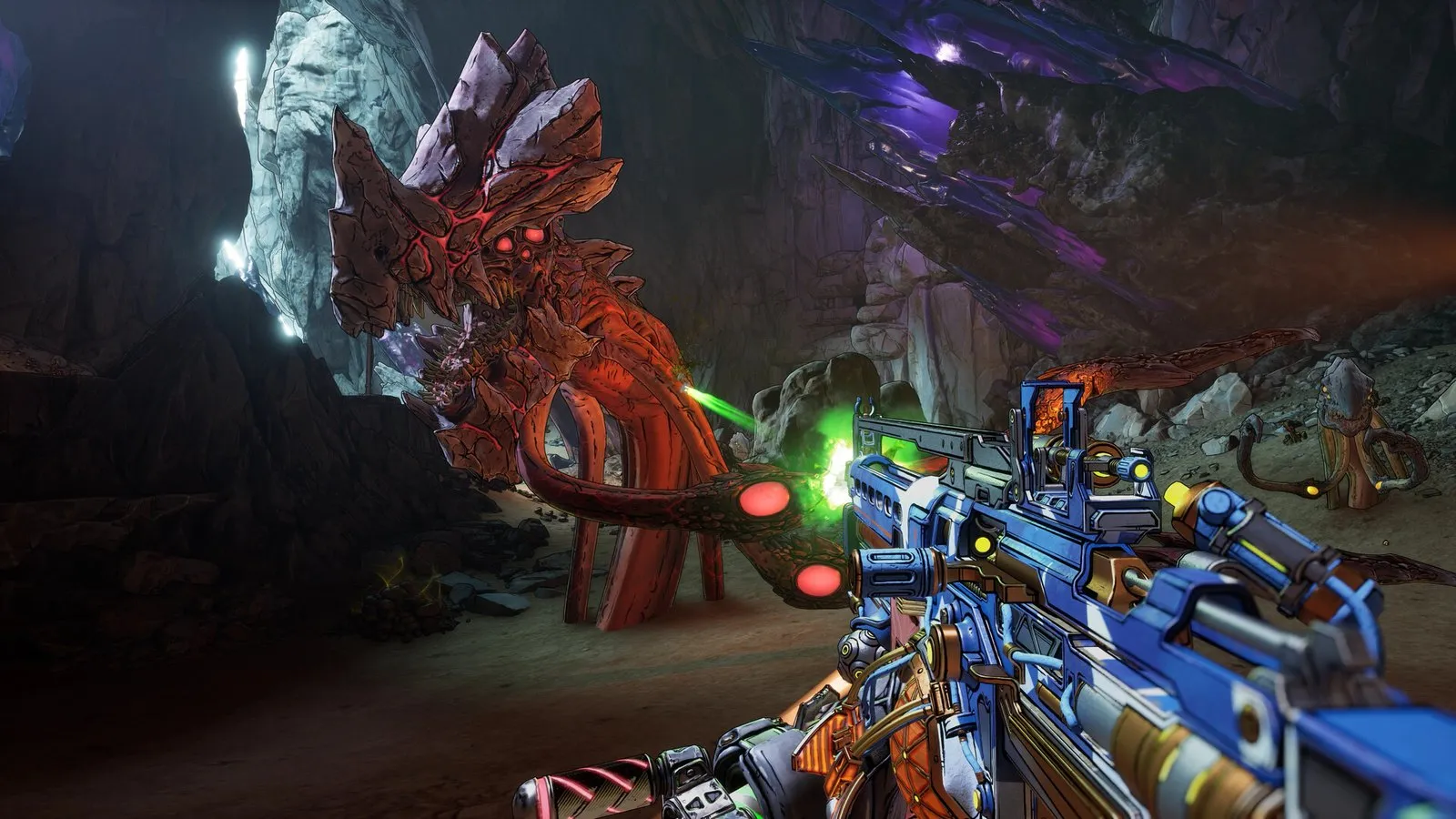Un rifle azul apunta a una bestia de piedra en una cueva oscura en Borderlands 4