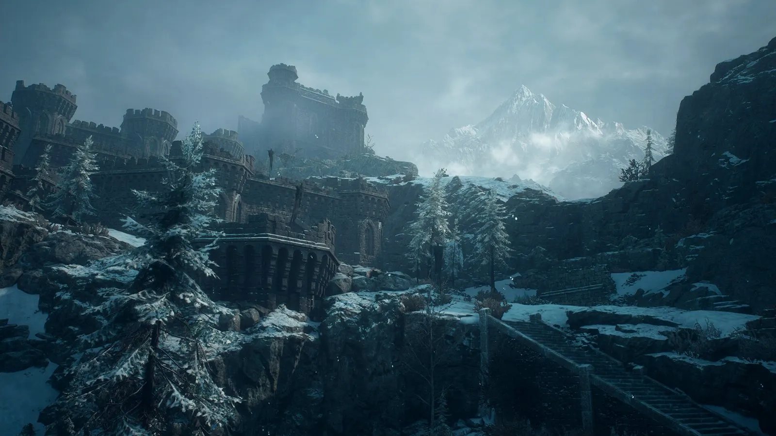 Paisaje de montañas nevadas y ruinas de piedra en la región de Norgan en Dragon's Dogma 2: Dark Arisen