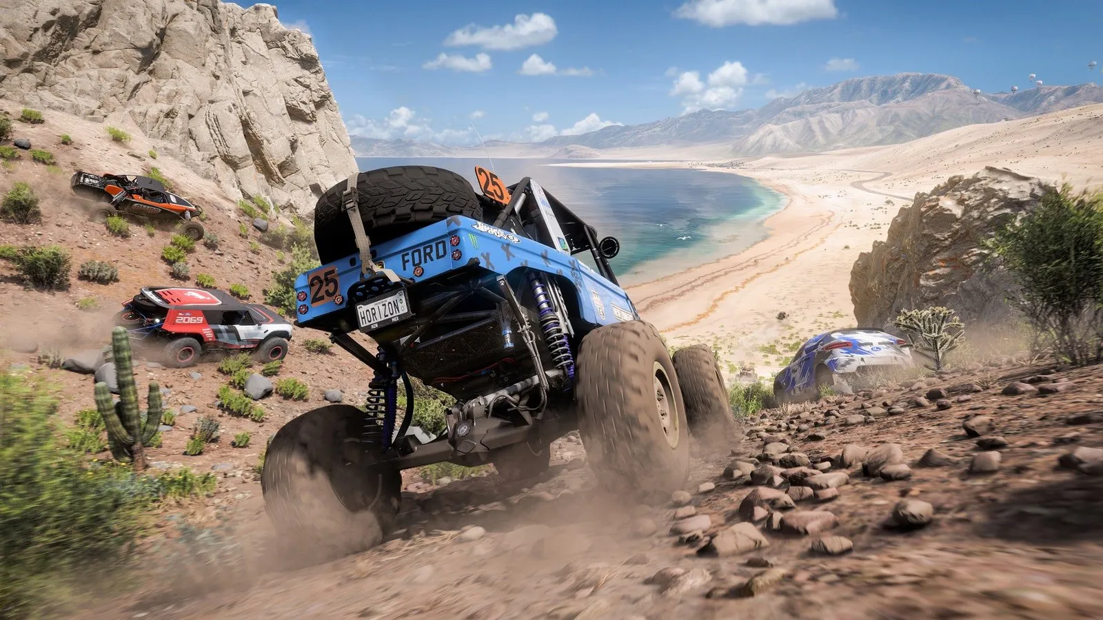 Un buggy azul salta por una pista de tierra junto a la costa mexicana en Forza Horizon 5
