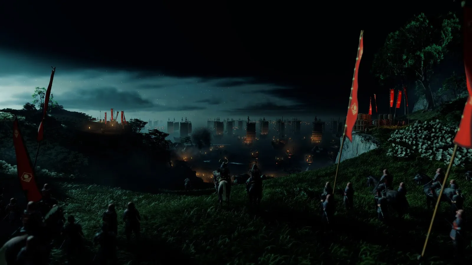 Un ejército con estandartes rojos acampa en un valle bajo el cielo nocturno en Ghost of Tsushima Director's Cut