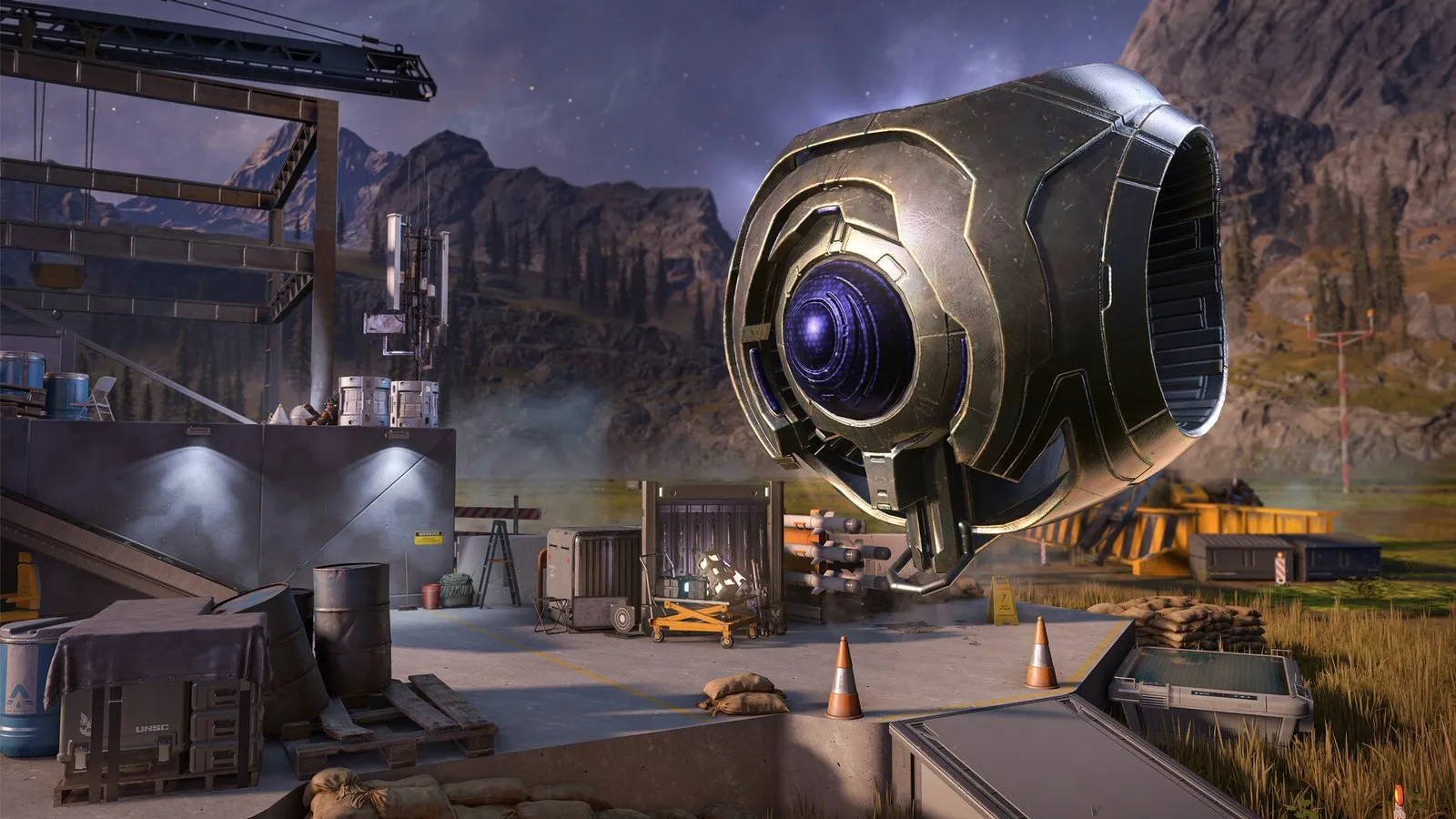 Un Guardián de los Forerunner flota sobre una base militar en el mapa de Zeta Halo en Halo Infinite