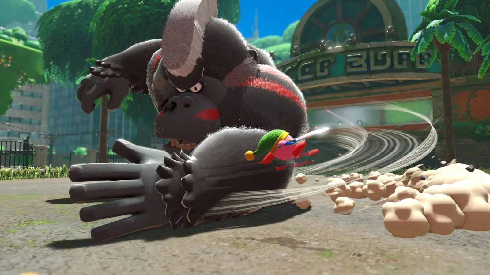 Un gorila gigante ataca a Kirby en una ciudad abandonada en Kirby y la tierra olvidada