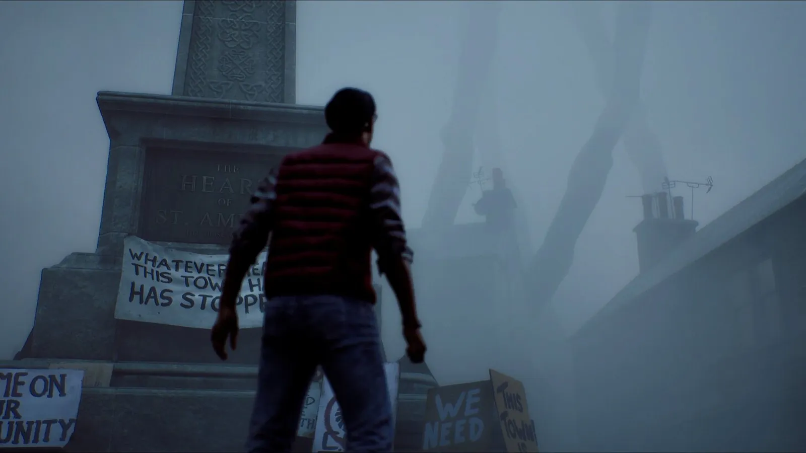 El protagonista observa un monumento entre la niebla en SILENT HILL: Townfall
