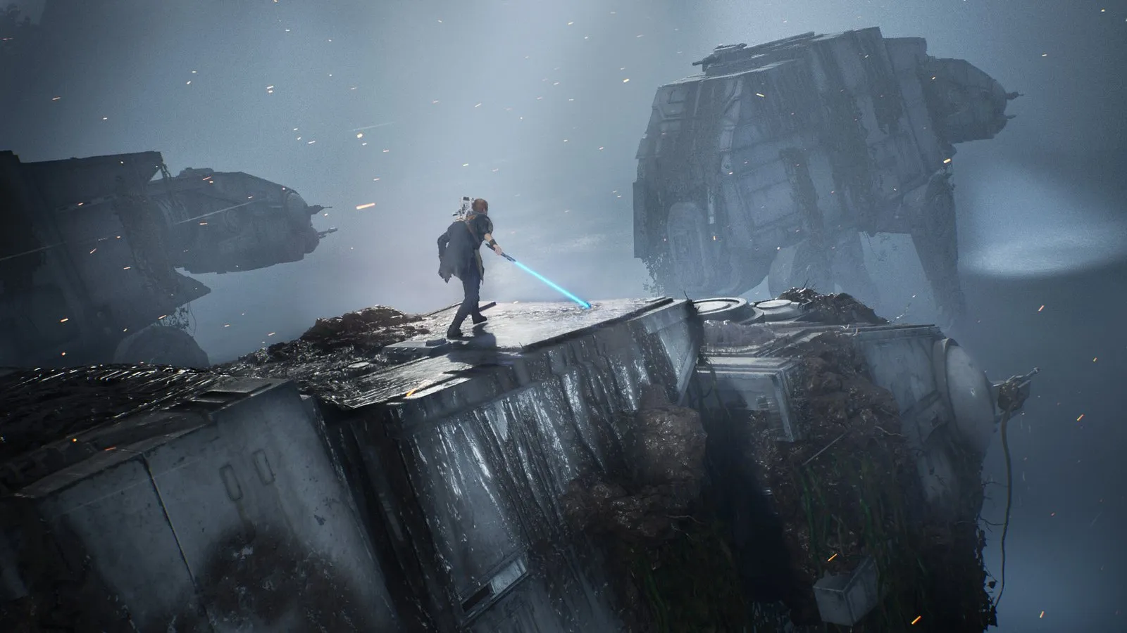 Cal, con el sable encendido, se alza sobre un AT-AT caído junto a otro en la niebla en Star Wars Jedi: Fallen Order