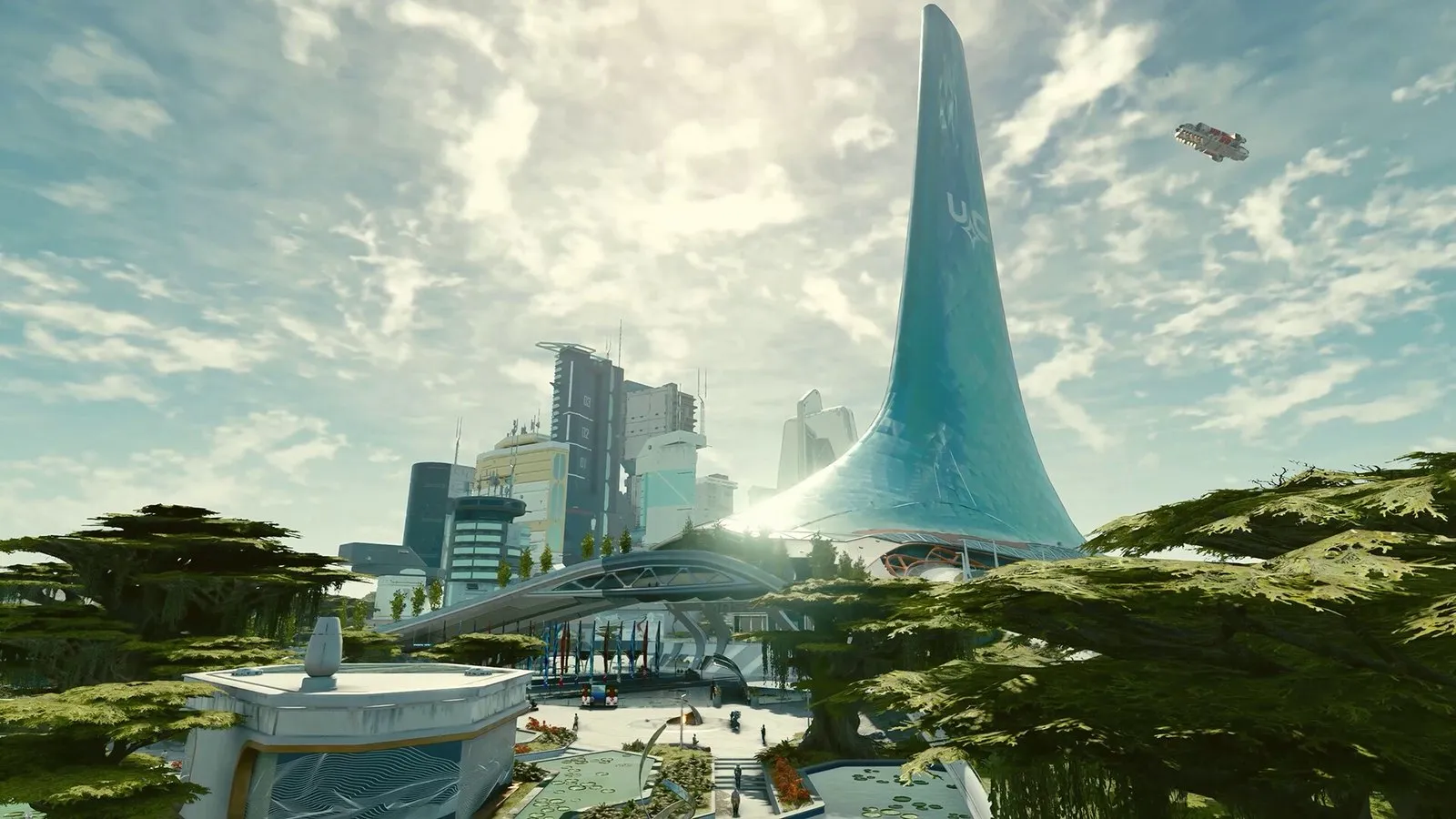La ciudad de Nueva Atlántida con su torre bajo un cielo azul en Starfield