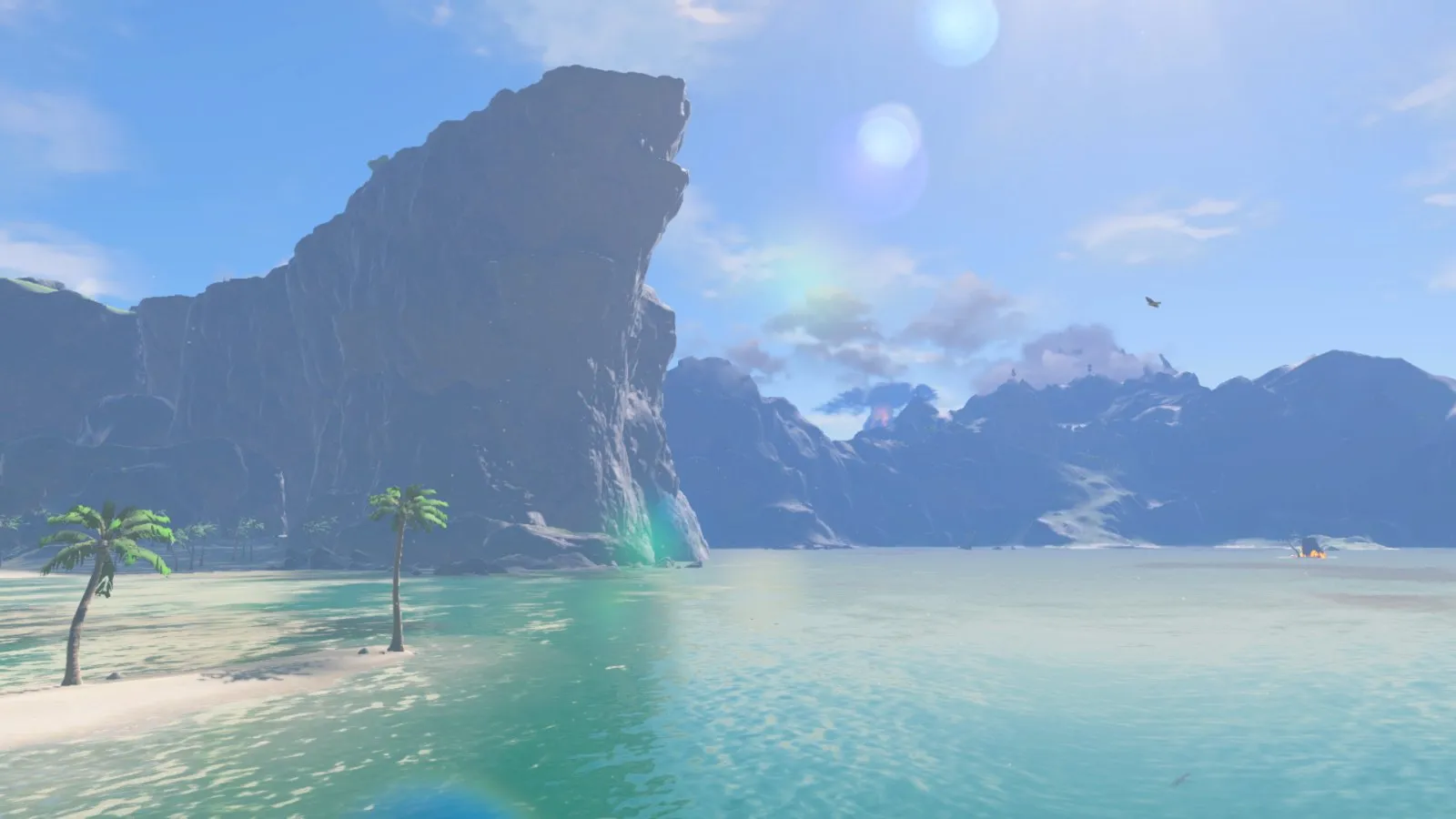Un paisaje de lago y acantilados en Hyrule en The Legend of Zelda: Breath of the Wild