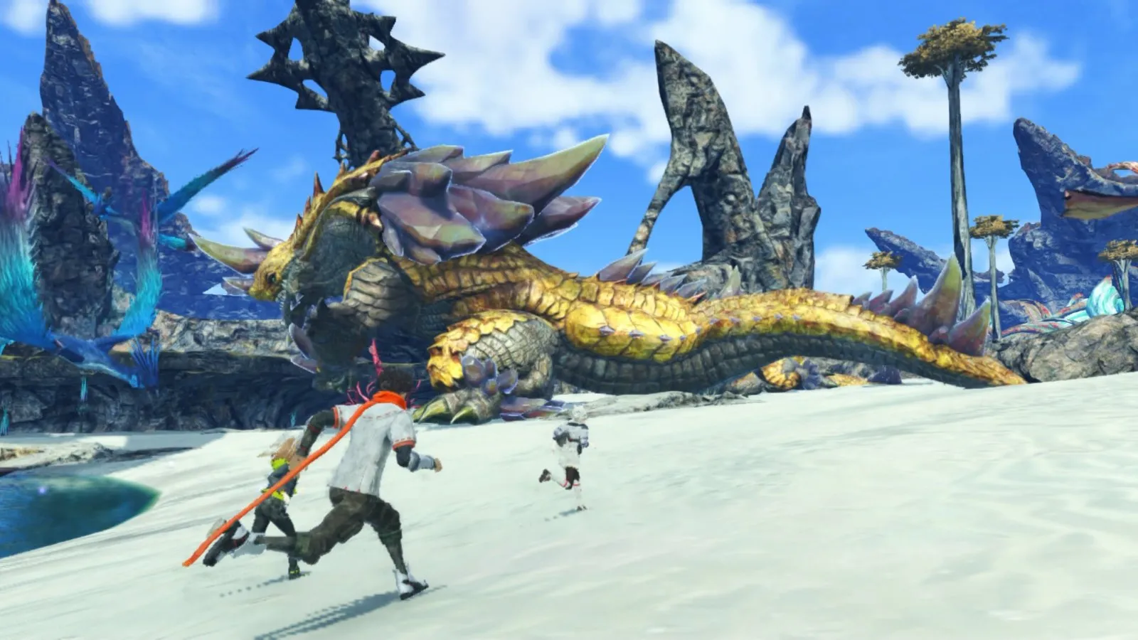 Noah y su grupo corren por una playa junto a un monstruo colosal en Xenoblade Chronicles 3