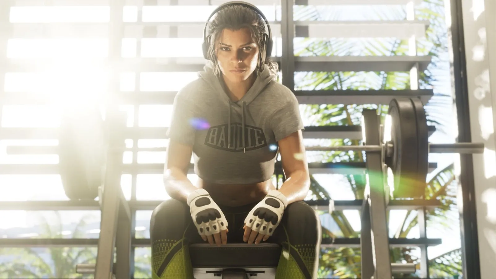Lucia Caminos sentada en un gimnasio en Grand Theft Auto VI
