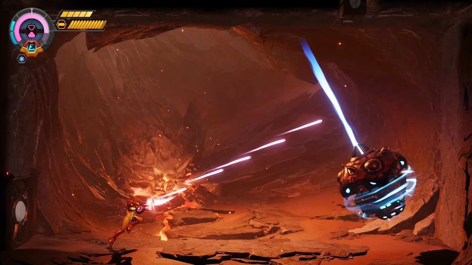 Samus dispara un rayo contra un enemigo en una cueva en Metroid Ravenous